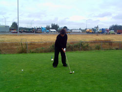 Sandra Tees off at Tri-Mountain Golf Course in Ridgefield, WA